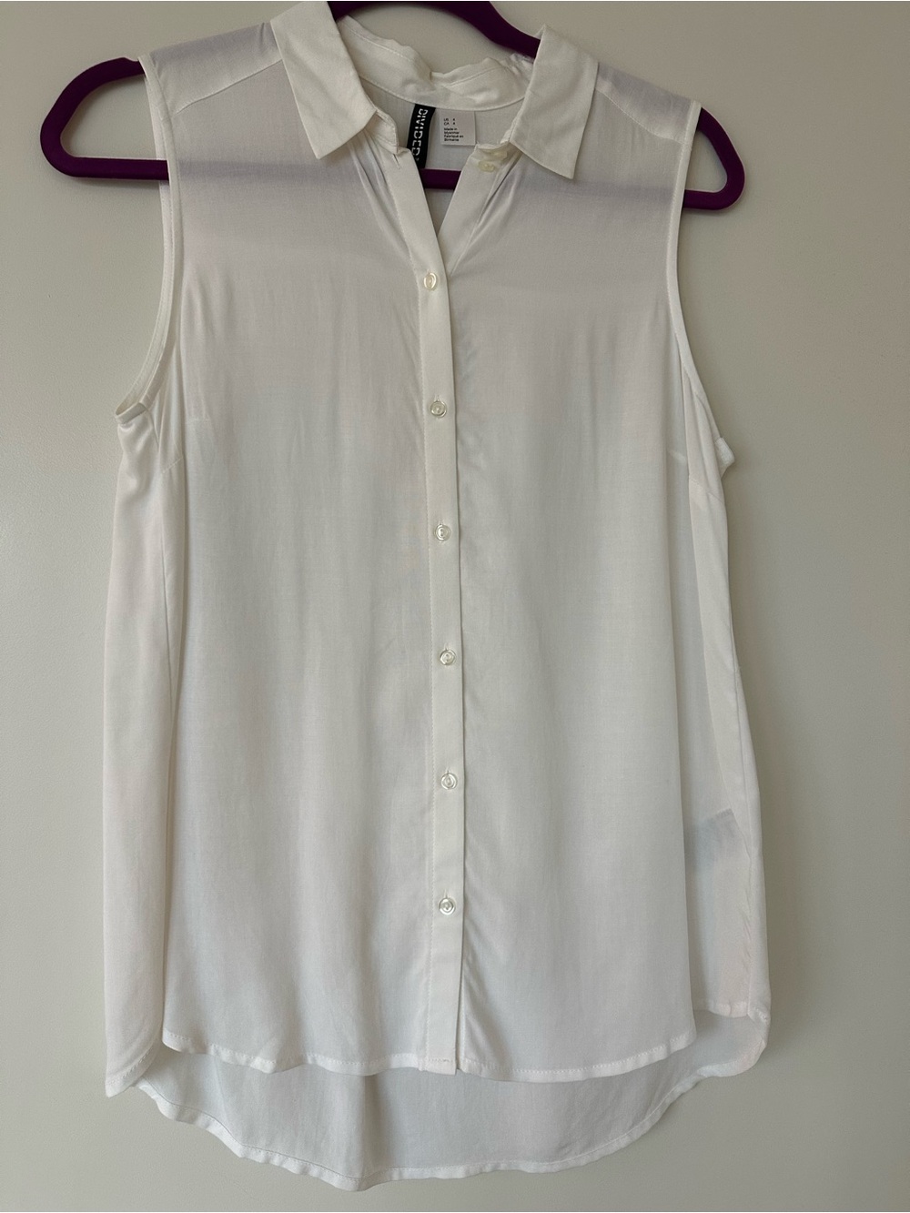 Divided White Sleeveless Button-Down Collared Top